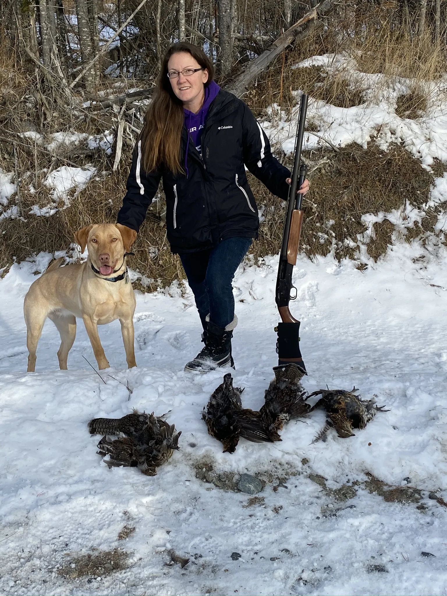 hunter, dog, anmd grouse in woods